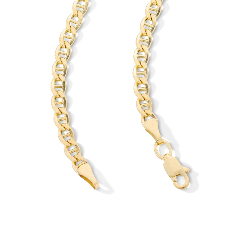 gold Mariner chain with oval-shaped links and a center bar, polished finish, and nautical-inspired design